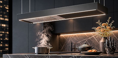 Eiland afzuigkap met ledverlichting boven kookeiland in open keuken