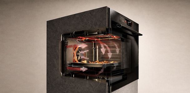 Doorzichtige weergave van magnetron binnenkant met grillelement hetelucht ventilator en verwarmingselementen