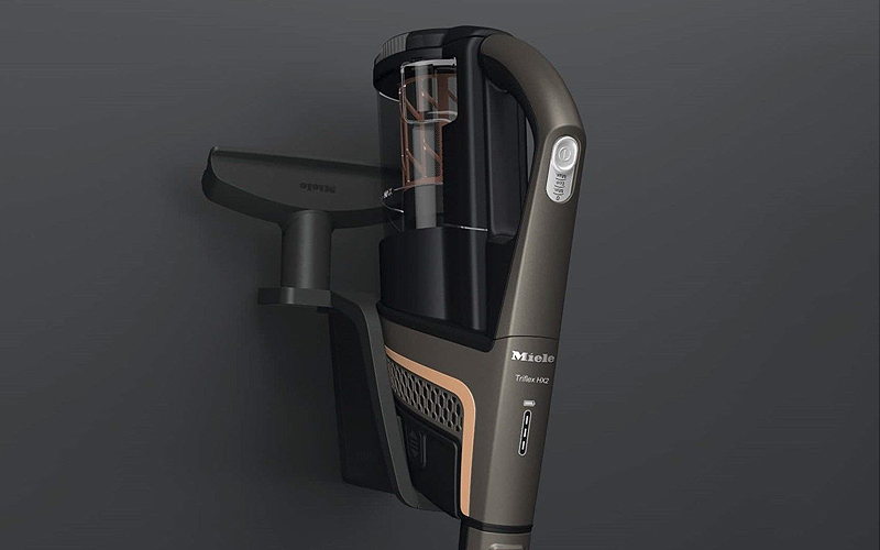 De wandhouder met driedelig accessoire