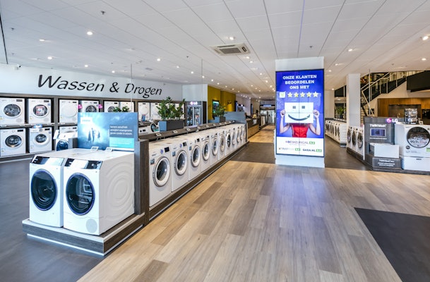 Wasmachine met waterslot kopen in een echte winkel.