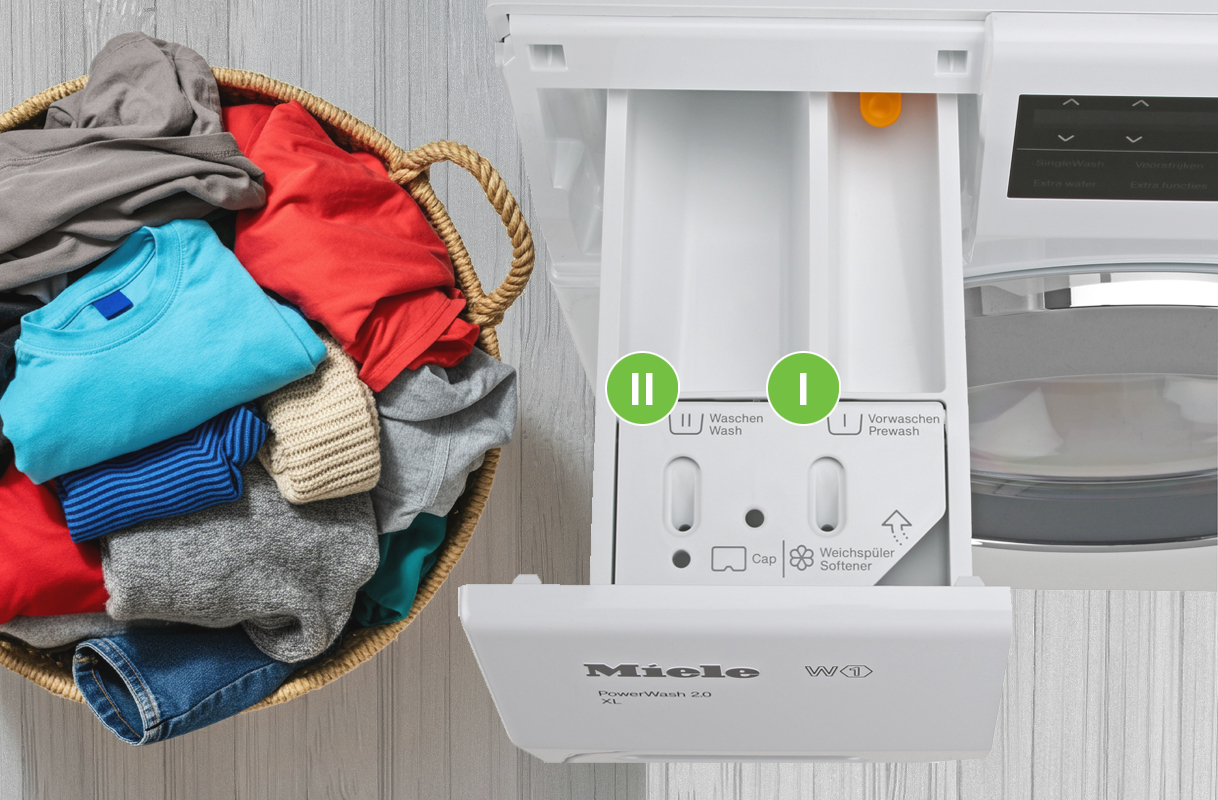 Wasmiddellade van een wasmachine met twee vakjes voor hoofdwas en wasverzachter