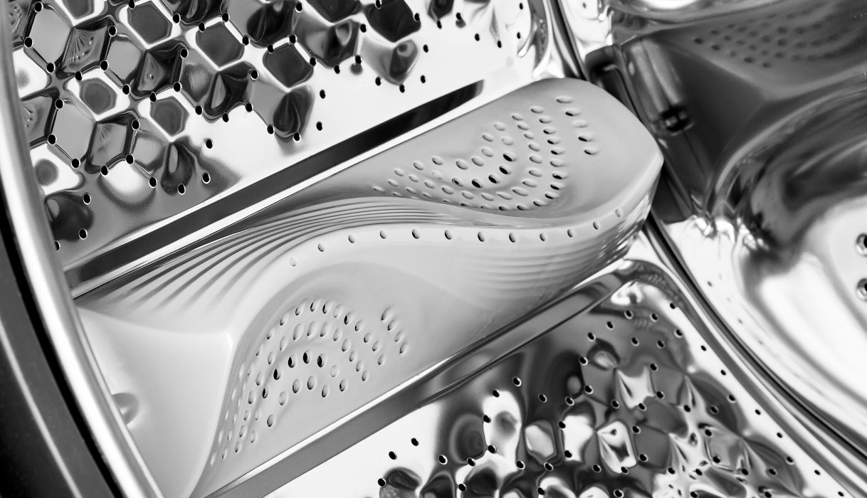 Close-up van Inventum WaveCare-trommel met golfpatroon en schoepen voor zachte kledingbehandeling