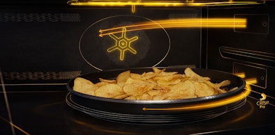 Whirlpool zwarte magnetron met CrispFry technologie voor krokante chips zonder olie op draaiplateau